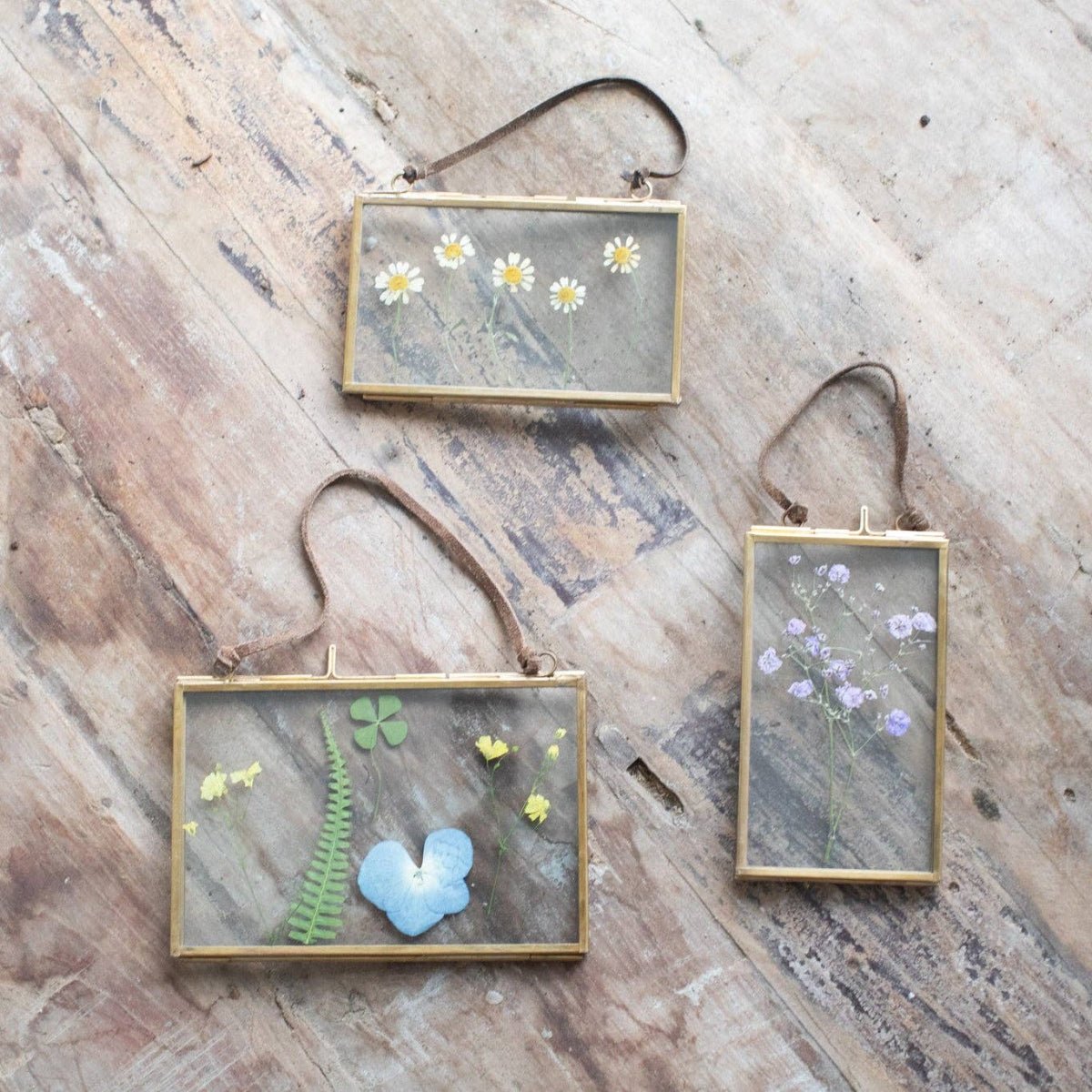 8f7803202f28f2e8c59d8f5f174a2bf4373eb8397f9b4eab44200522158d1745.jpg Brass + Glass Small Floating Frames - Image 2